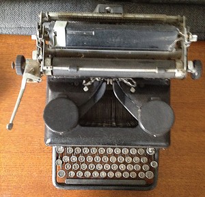 My old typewriter, that I purchased at an antique store in the middle of nowhere, Arkansas, for a mere $35. Every writer needs an old typewriter, mainly to remind us how far we've come. My author J.L. Gentry even writes his first drafts on a typewriter.
