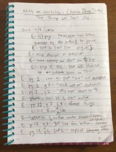Scribbled notes about the book in a notebook 